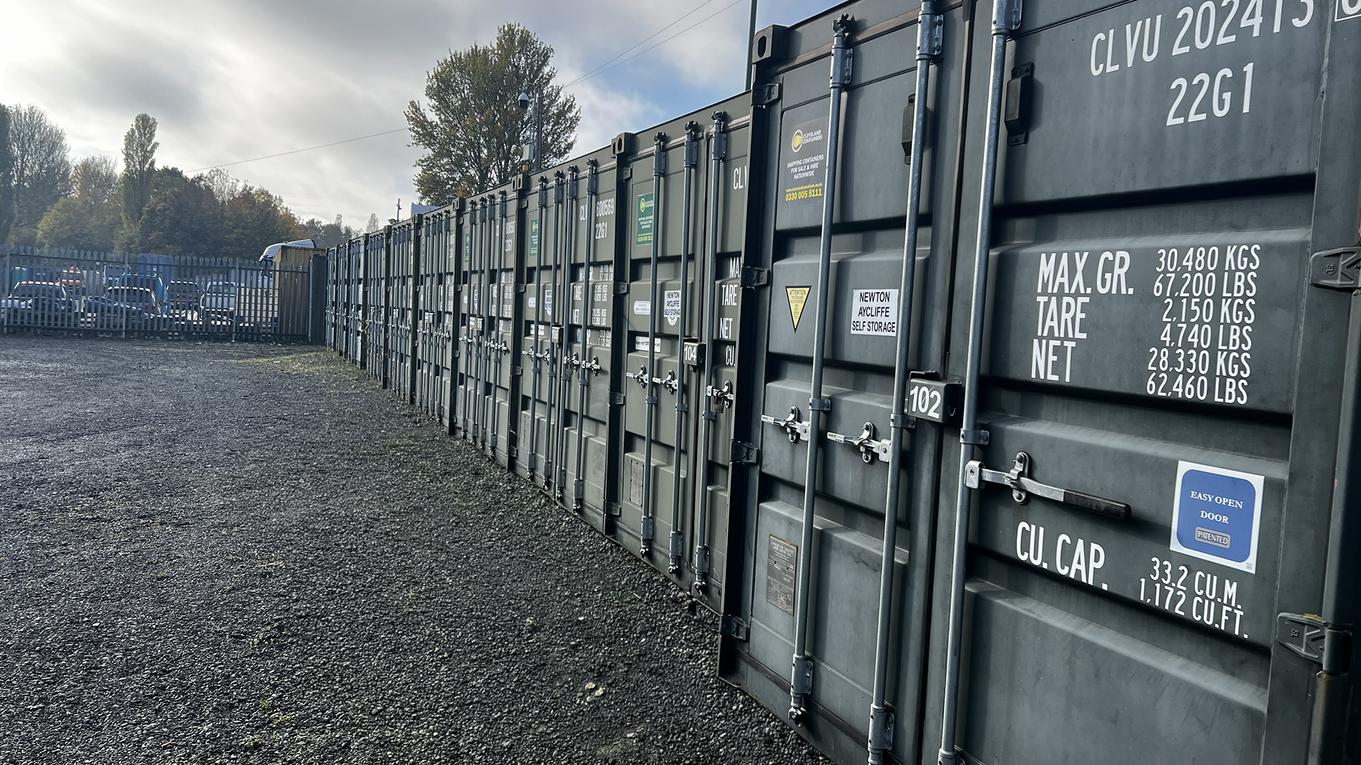 A row of green storage container doors at A1